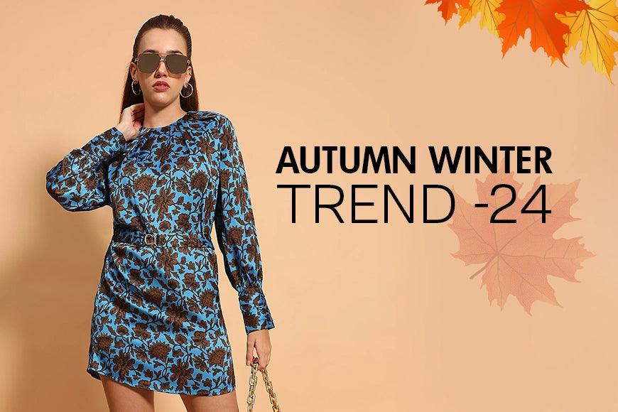 Woman in blue floral dress with sunglasses, fall fashion, autumn winter trend 2024