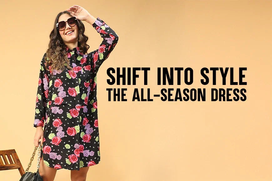 Woman in a floral print shift dress modeling plus size trendy fashion against a beige background