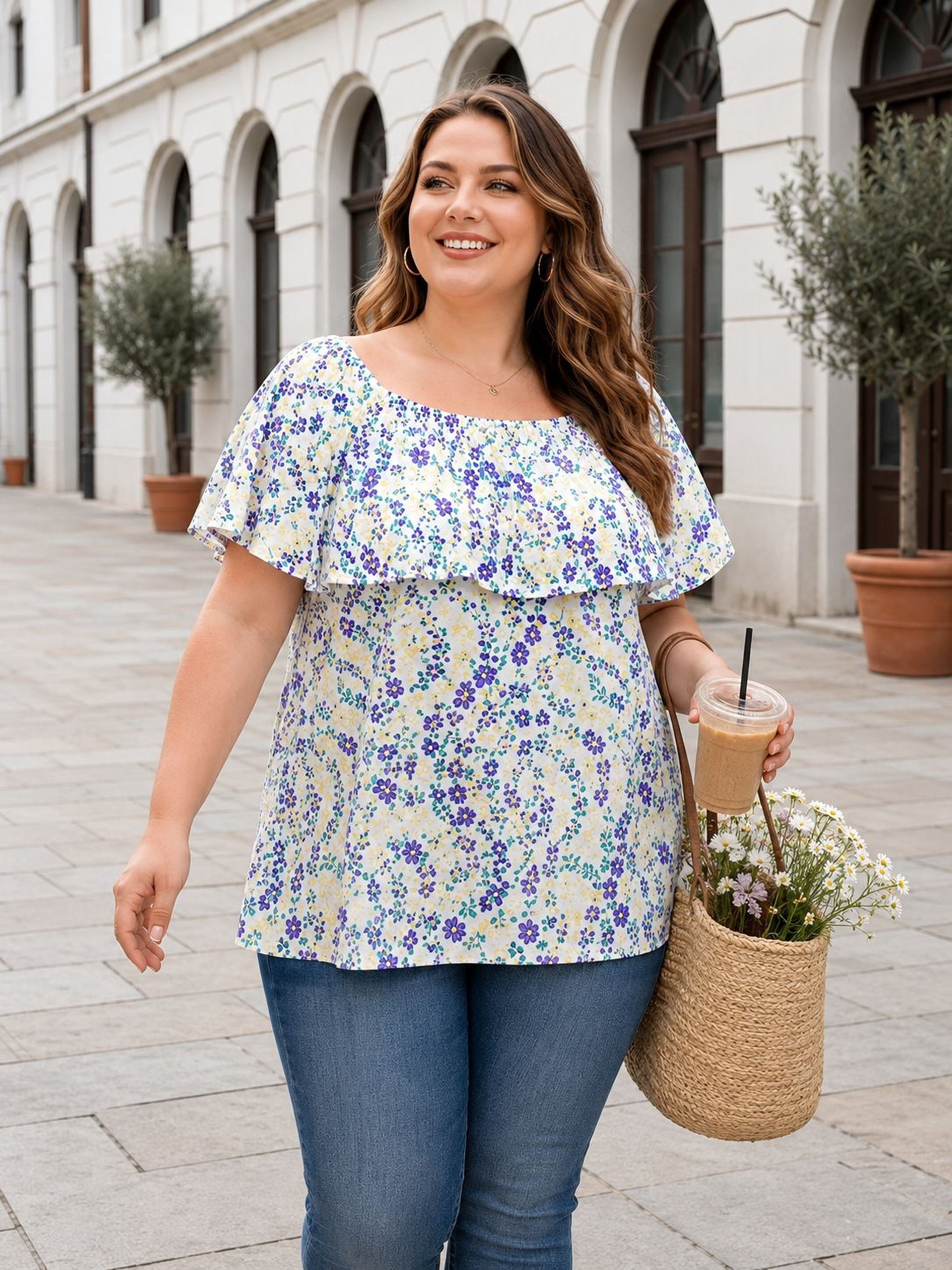 A woman wearing a floral print top and carrying a woven basket with flowers is walking on a sidewalk.