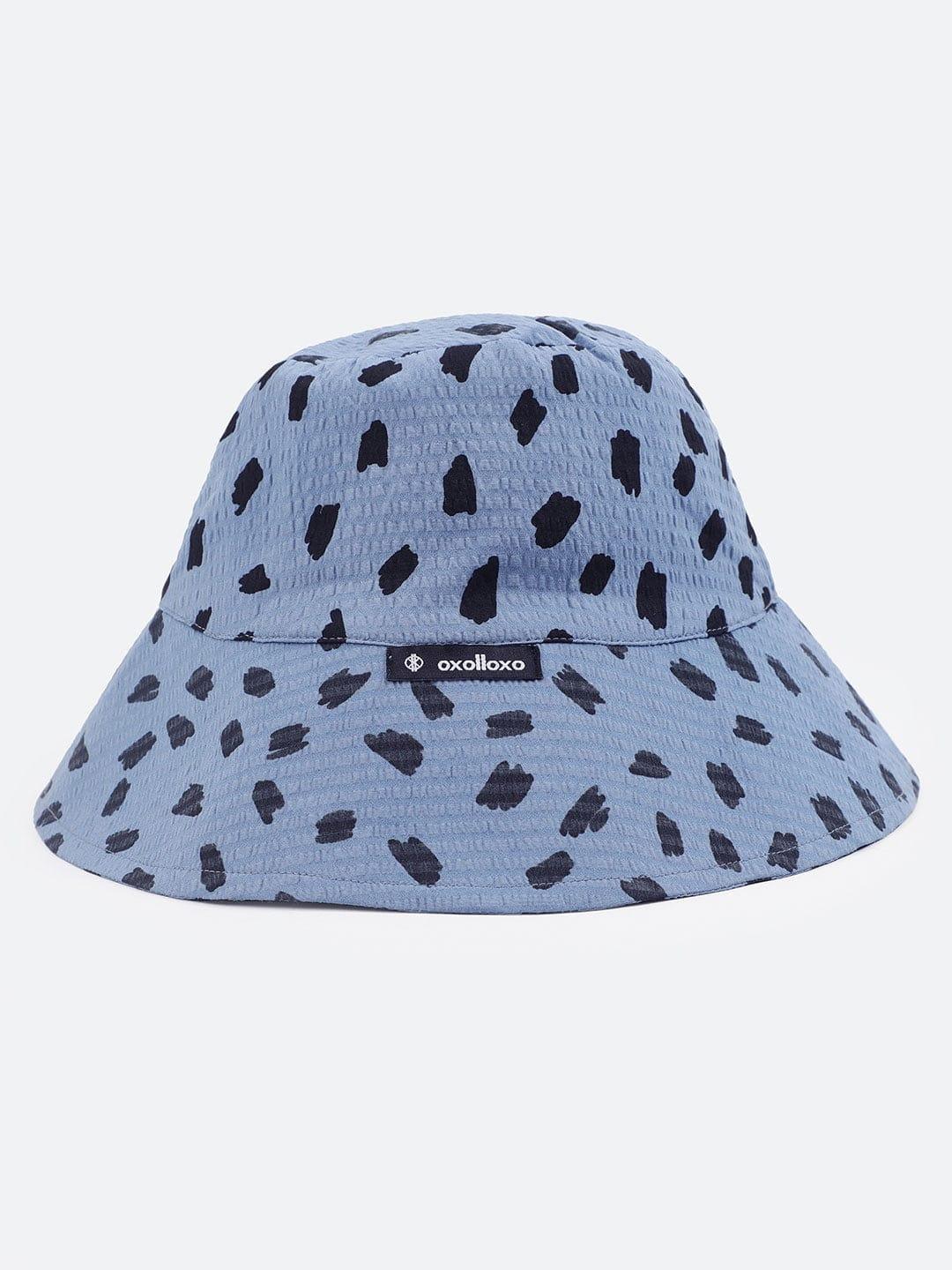Playful Elegance: White Embroidered Loopy Top & Blue Animal Print Bucket Hat Set   oxolloxo