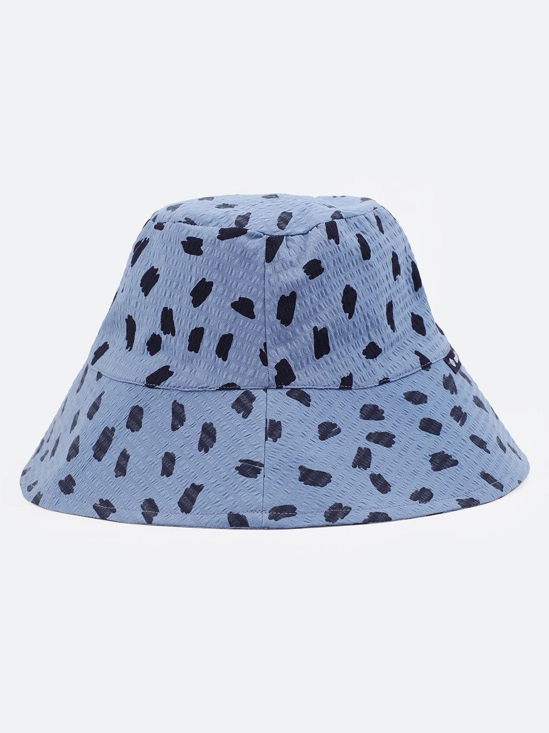 Playful Elegance: White Embroidered Loopy Top & Blue Animal Print Bucket Hat Set   oxolloxo