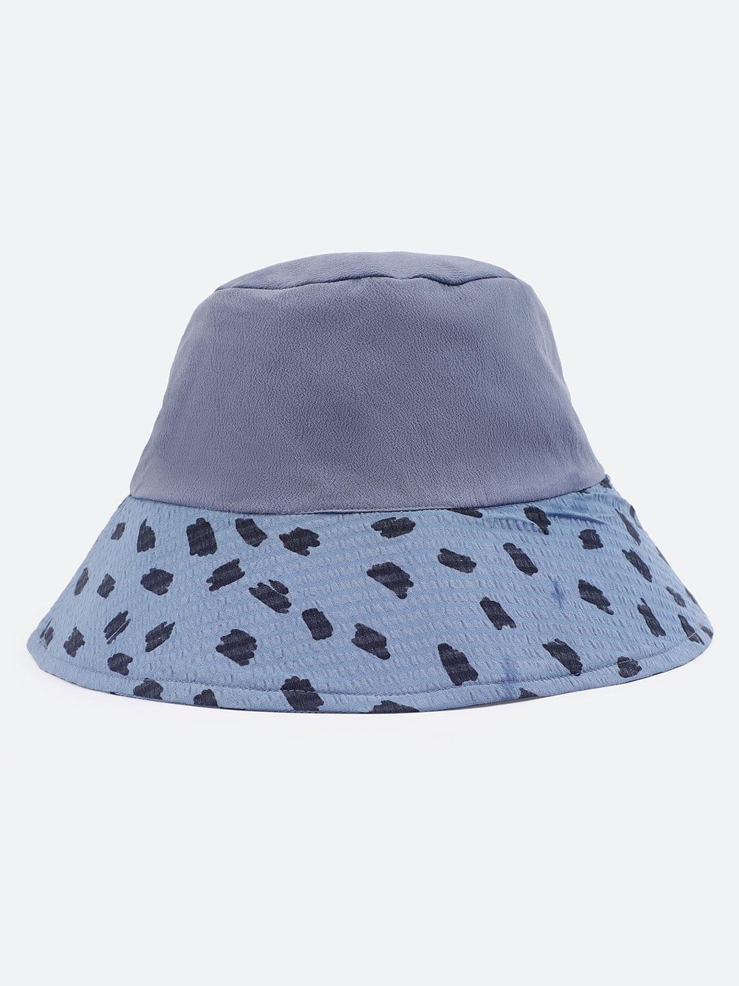 Playful Elegance: White Embroidered Loopy Top & Blue Animal Print Bucket Hat Set   oxolloxo