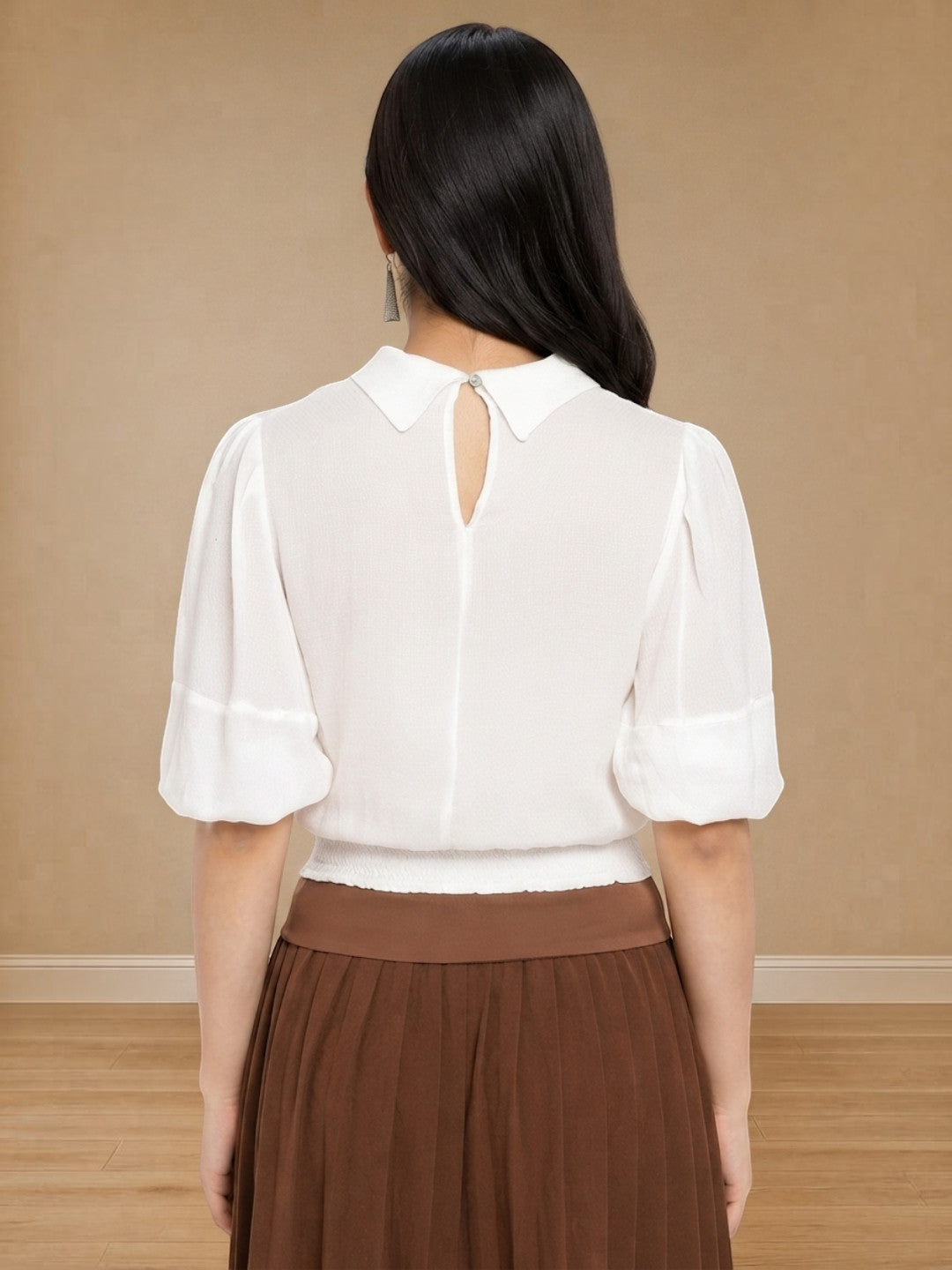 White blouse with keyhole back and puff sleeves paired with brown pleated skirt for women's fashion