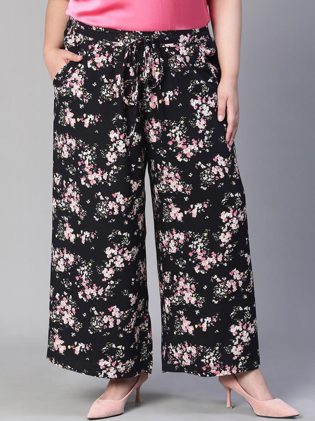 Plus size black floral print flared pants with tie-knot waist