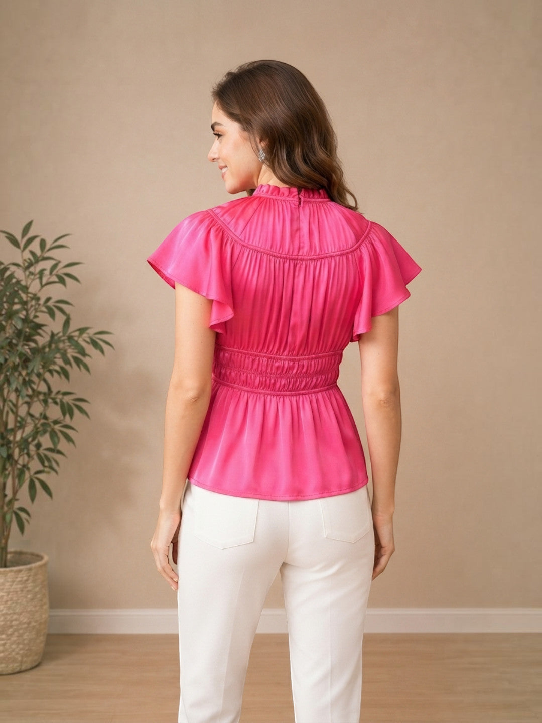 Pink ruffled peplum top with white pants, stylish women's fashion outfit