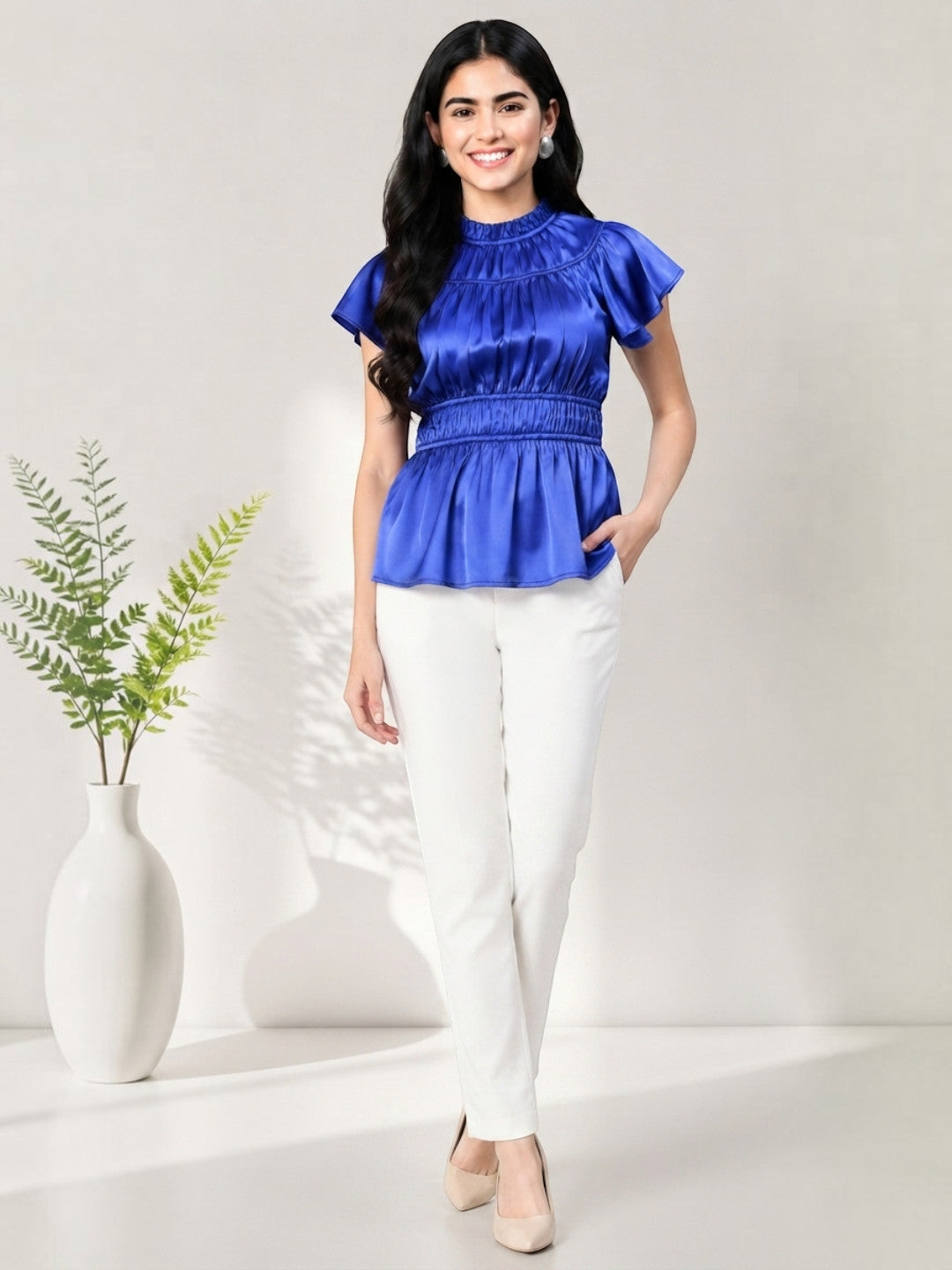 Royal blue peplum top with ruffled sleeves paired with white pants, stylish women's fashion outfit