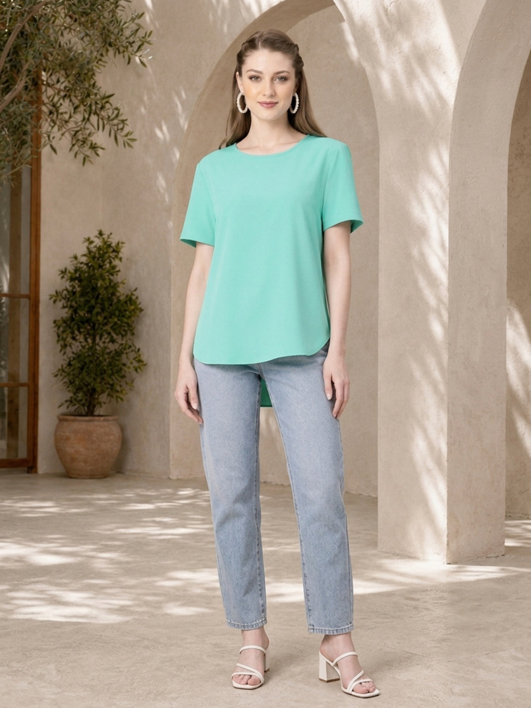 Mint green women's t-shirt with light wash jeans, casual summer outfit for plus size & regular sizes