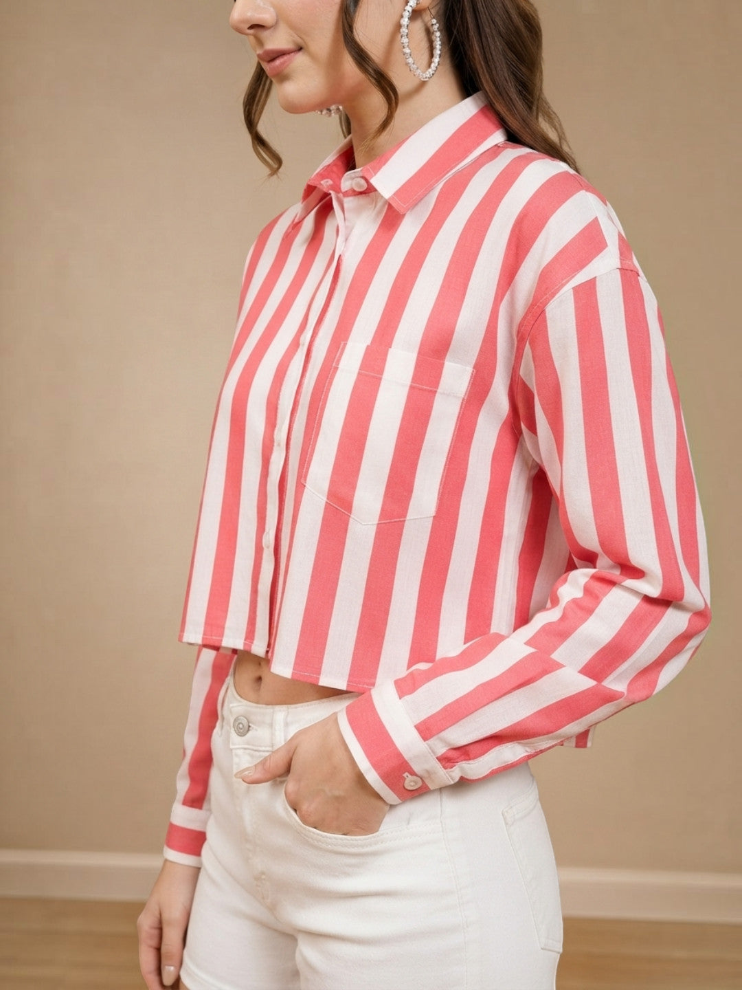 Pink and white striped cropped button-up shirt for women, paired with white jeans, stylish casual wear