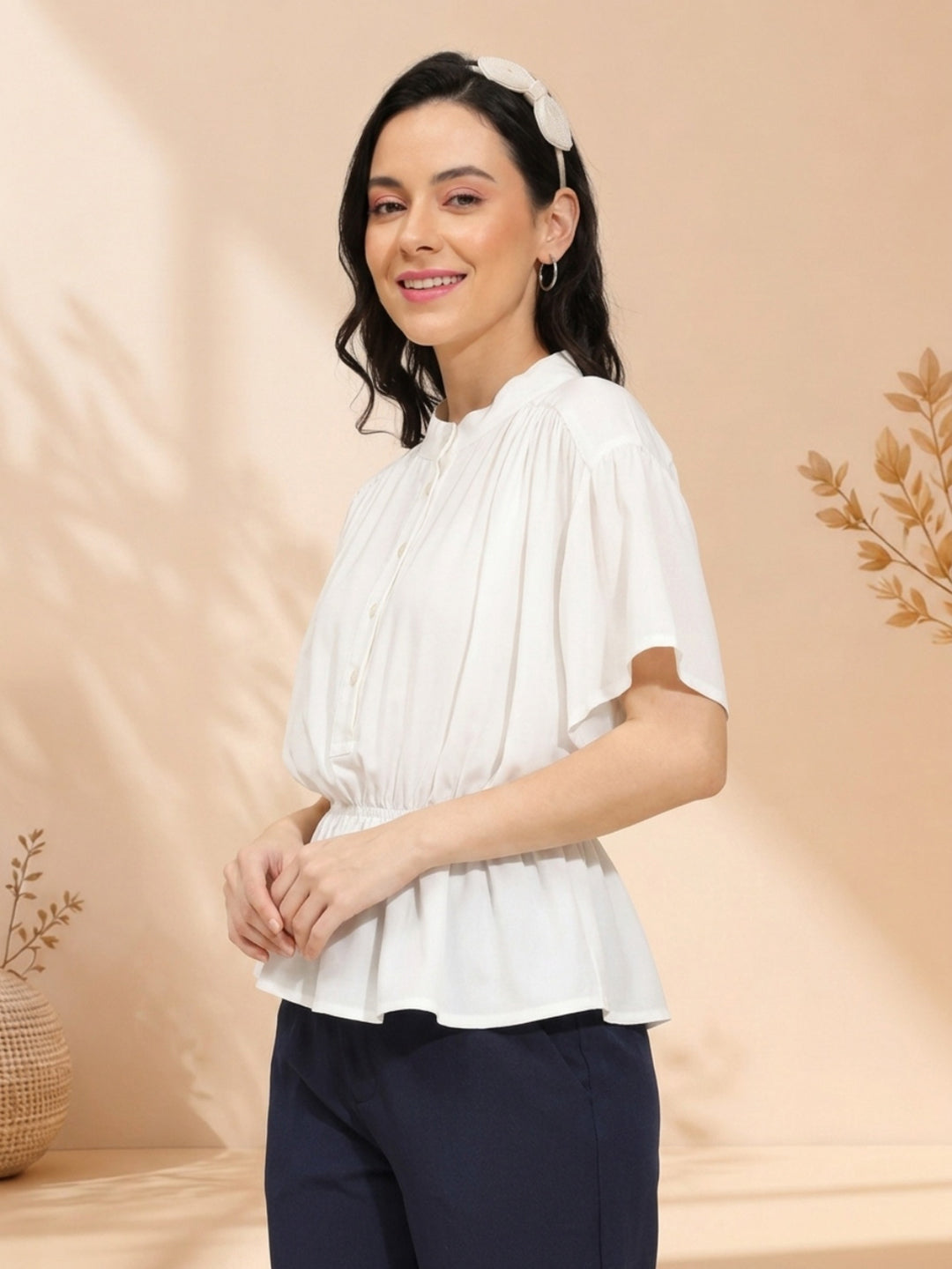 White pleated peplum blouse with short sleeves, stylish women's fashion top for casual wear