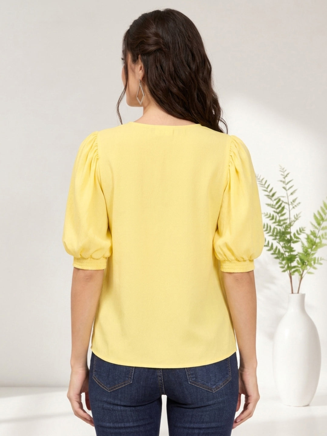 Yellow puff sleeve top for women, back view with jeans, trendy plus size fashion