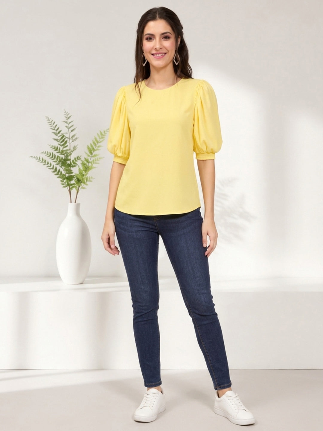 Yellow puff sleeve top with blue jeans, stylish women's fashion outfit for casual wear