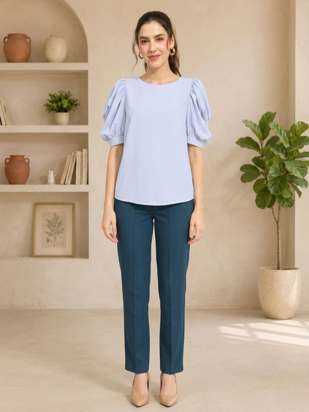 Light blue puff sleeve top with teal trousers, stylish women's fashion outfit