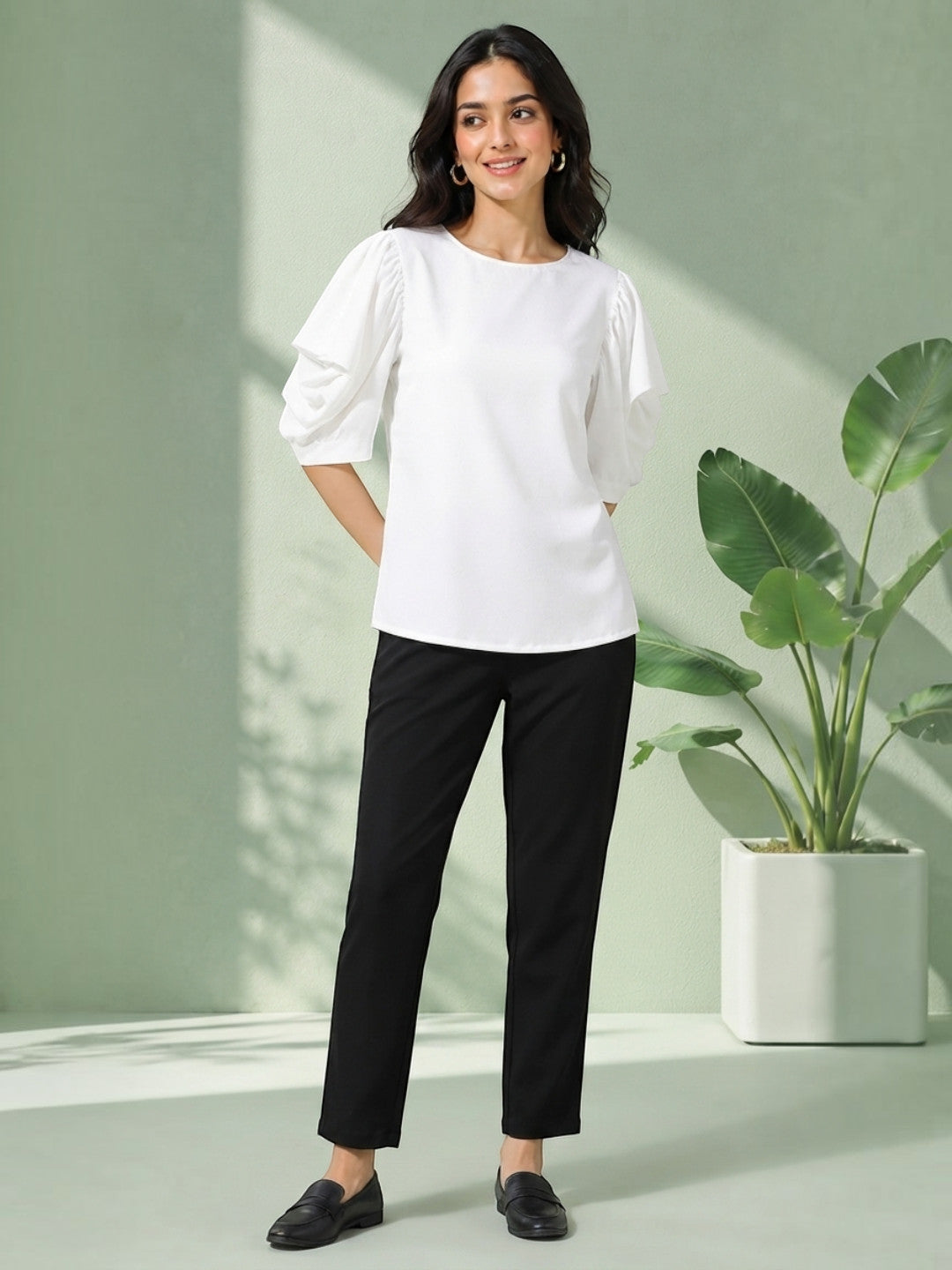 White puff sleeve top with black cropped pants, stylish women's fashion outfit