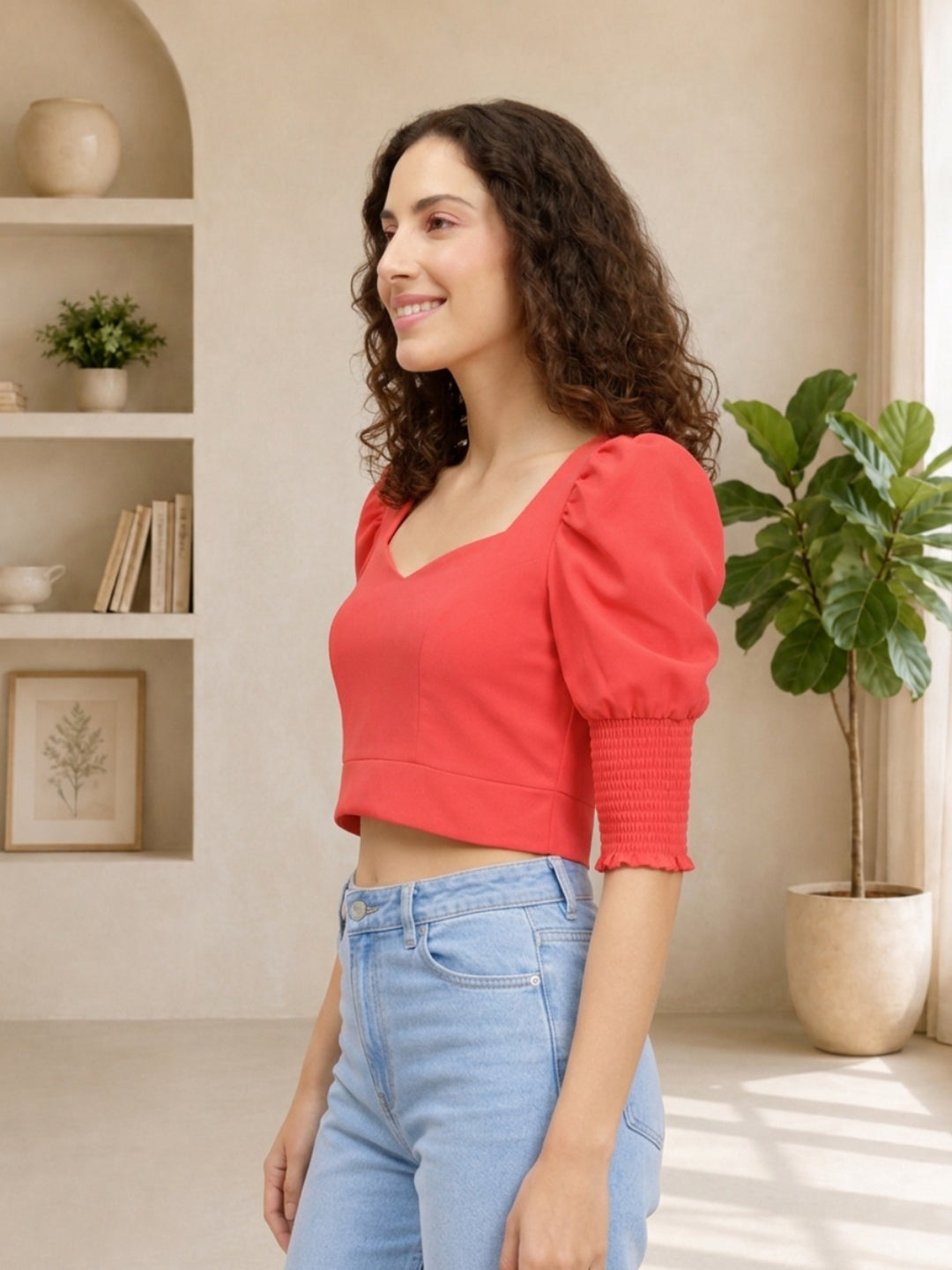 Red cropped top with puff sleeves and V-neck, paired with light blue jeans for women's fashion