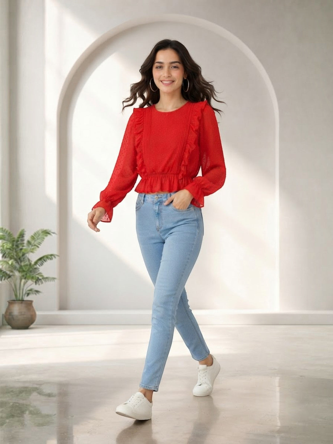 Woman in red ruffle blouse and light blue jeans, stylish casual outfit for women