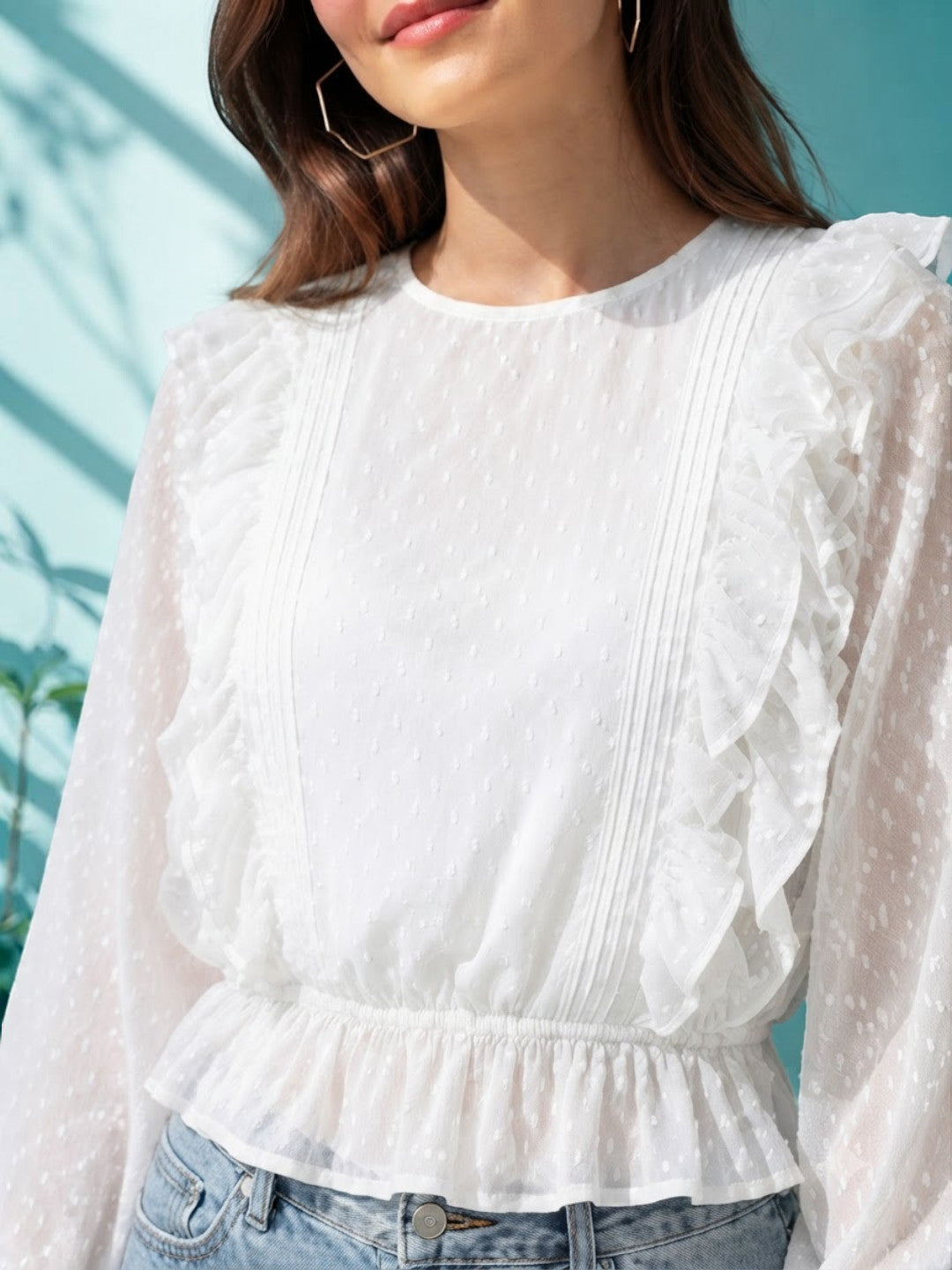 White ruffled blouse with polka dots, long sleeves, and peplum hem for women's fashion