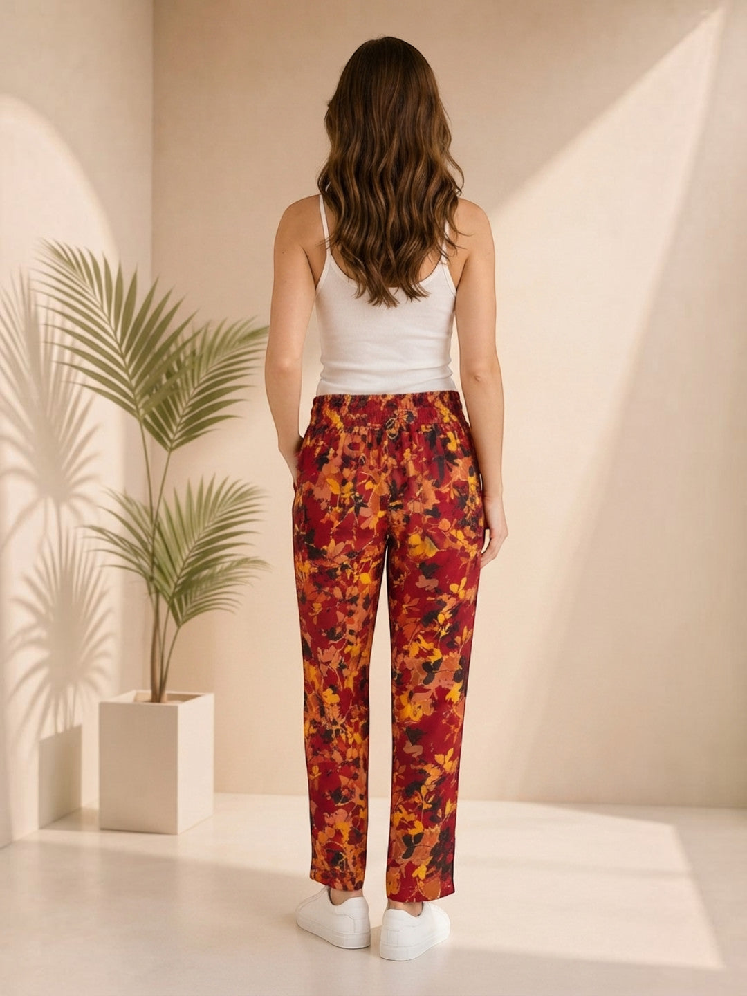 Floral print pants for women, stylish and comfortable, paired with white top and sneakers