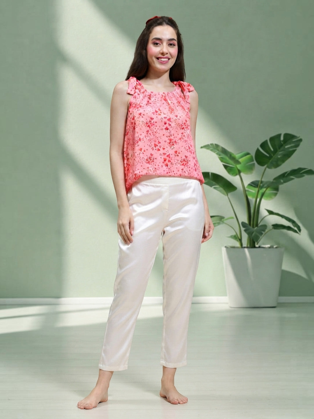 Pink floral sleeveless top with white satin pants, plus size women's fashion