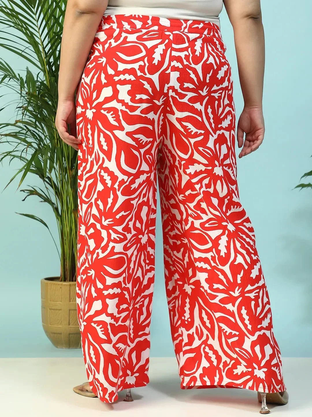 Ruby Red Floral Print Flared Elasticated Waist With Tie-Up Detail Plus Size Women Pant - oxolloxo