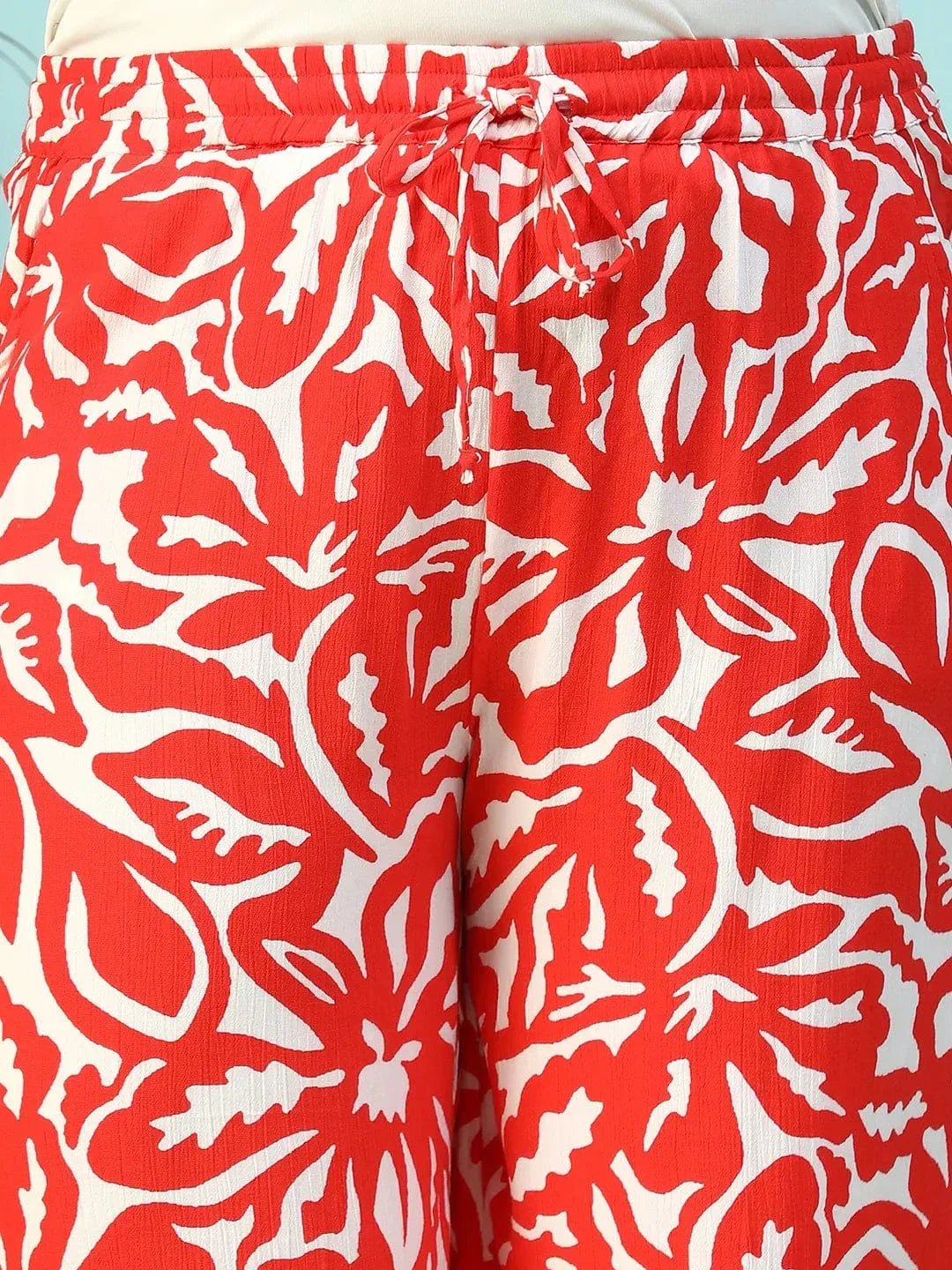 Ruby Red Floral Print Flared Elasticated Waist With Tie-Up Detail Plus Size Women Pant - oxolloxo