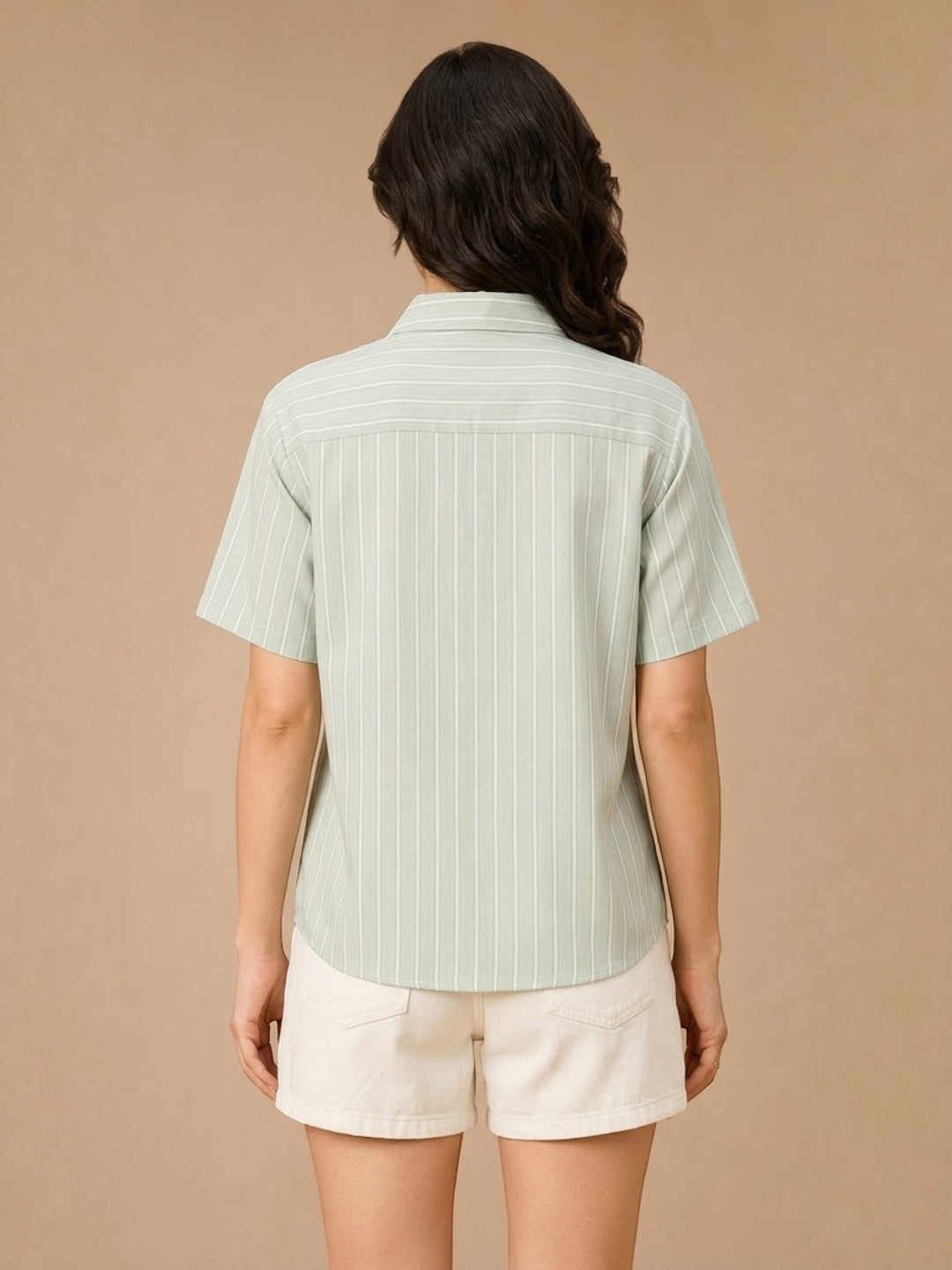 Mint green striped short sleeve shirt for women, back view with cream shorts, casual summer outfit