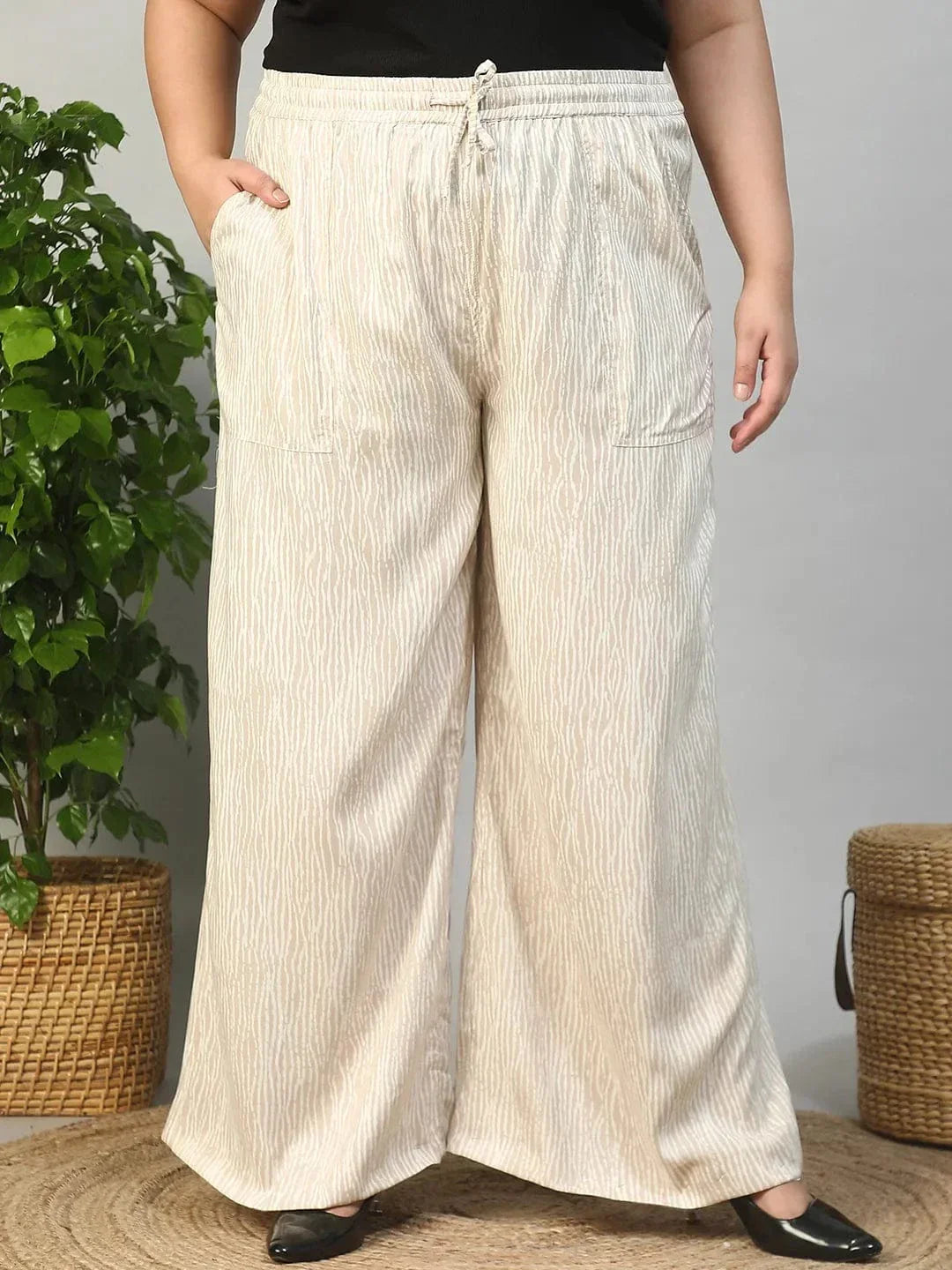 Beige Elasticated With Tie -Up Detail Rayon Dot Print Plus Size Women Flare Pant - oxolloxo