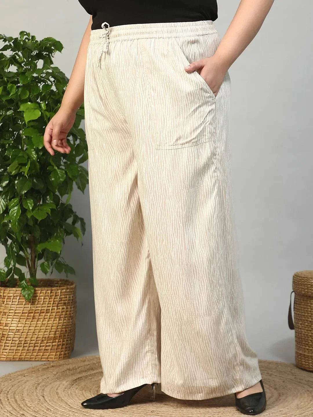 Beige Elasticated With Tie -Up Detail Rayon Dot Print Plus Size Women Flare Pant - oxolloxo