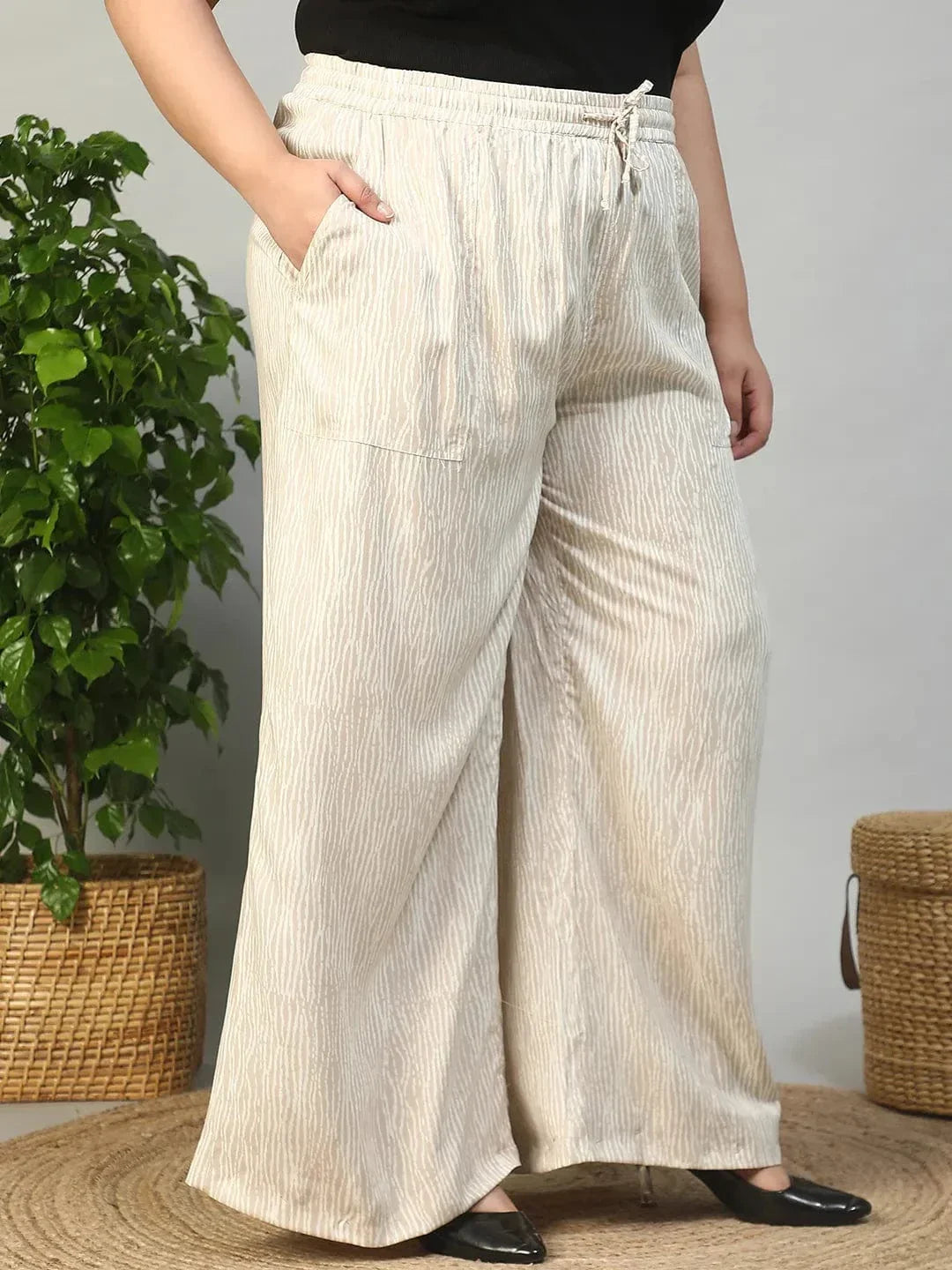 Beige Elasticated With Tie -Up Detail Rayon Dot Print Plus Size Women Flare Pant - oxolloxo