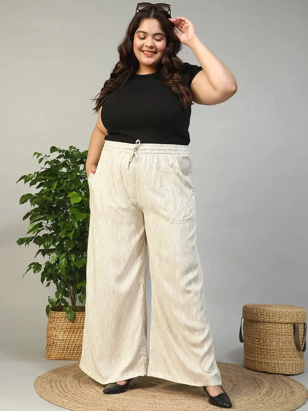 Beige Elasticated With Tie -Up Detail Rayon Dot Print Plus Size Women Flare Pant - oxolloxo