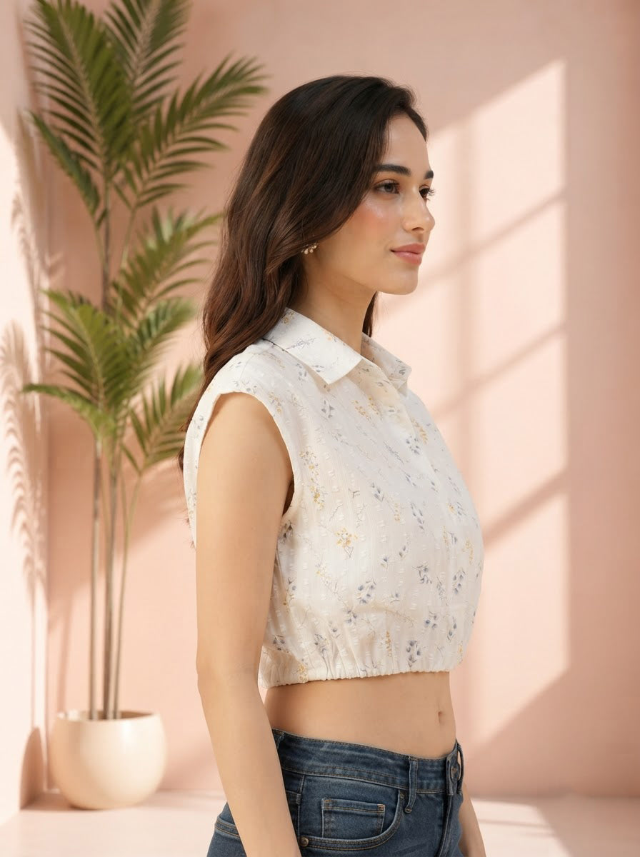 Floral sleeveless crop top for women, stylish summer fashion with collar detail, paired with jeans