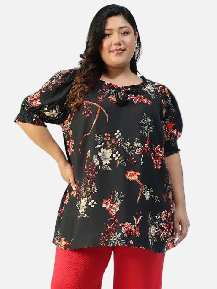 Plus size black floral ruffle top with tie-up tassels
