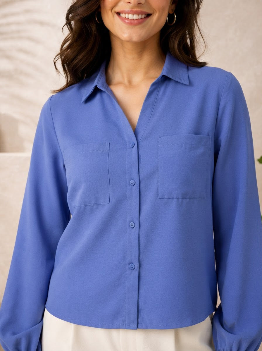 Blue button-down blouse with chest pockets, stylish women's fashion top