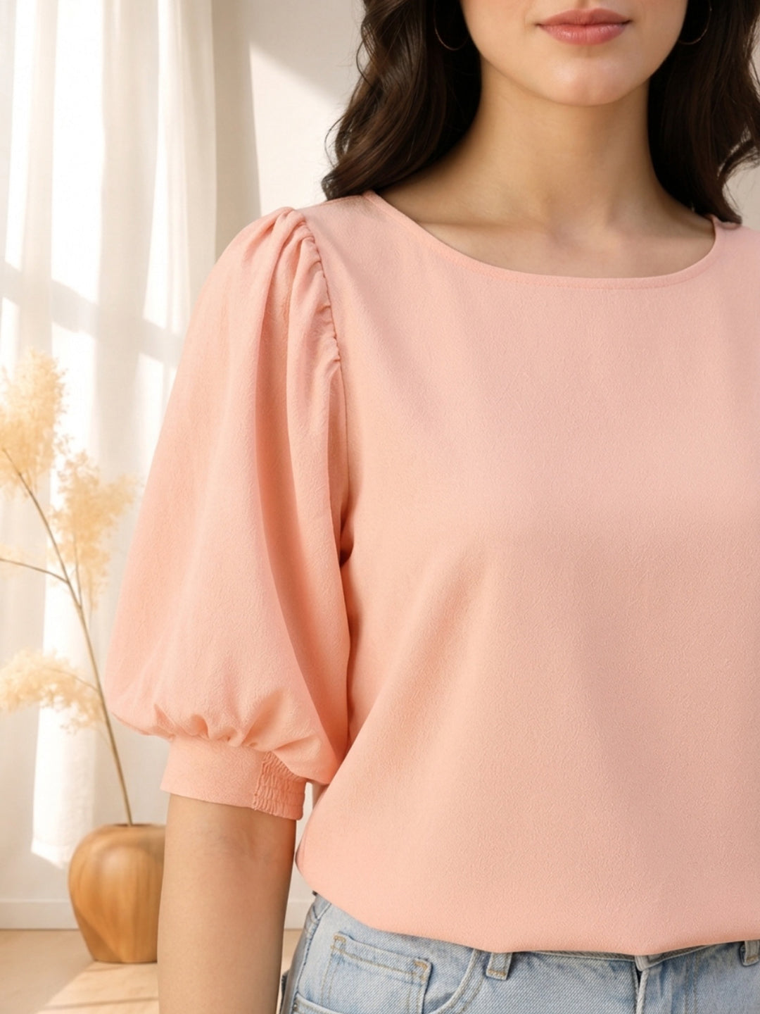 Soft pink puff sleeve top for women, stylish and comfortable, perfect for casual wear