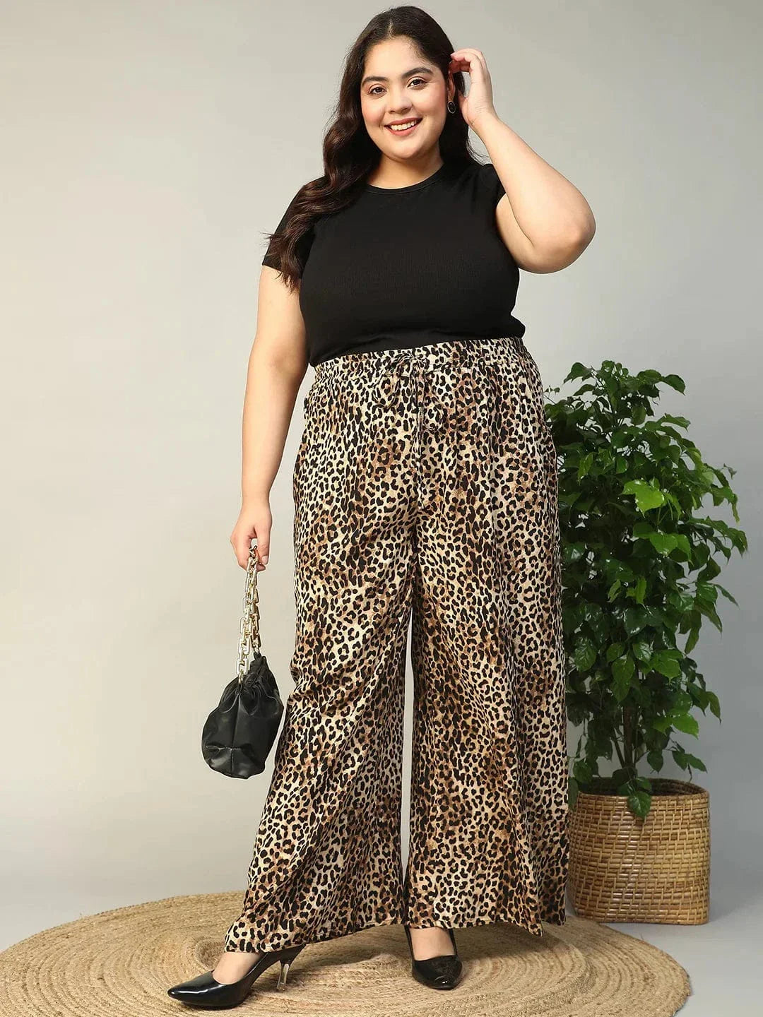 Multicolor Animal Print Elasticated With Tie-Up Detail Plus Size Women Flare Pant - oxolloxo