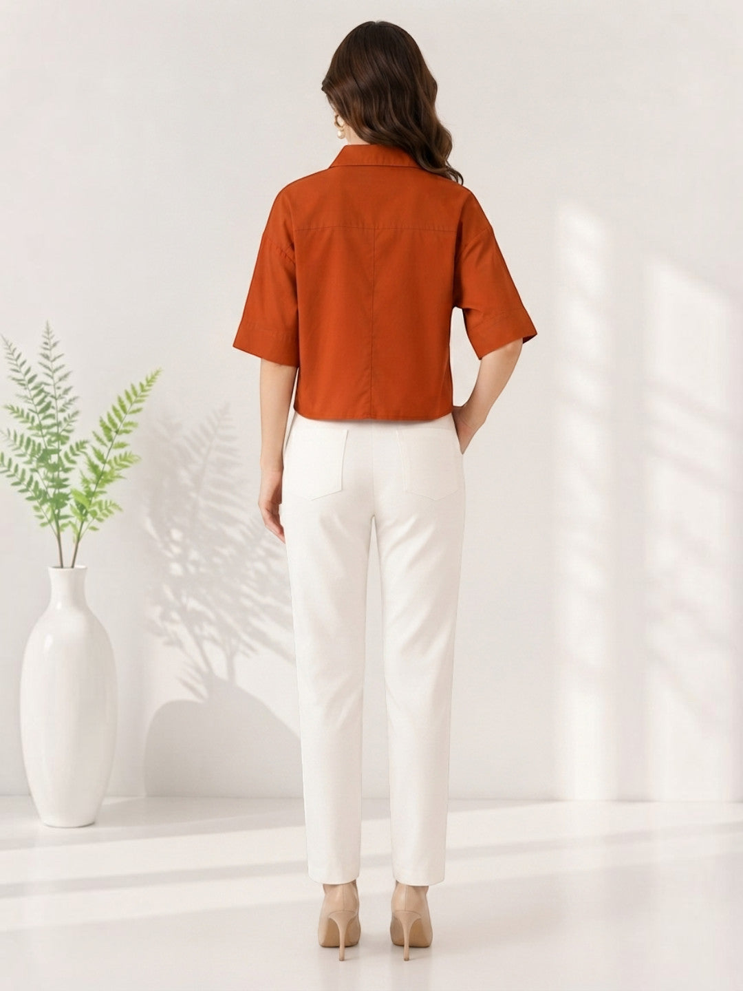 Rust crop shirt with white pants, plus size women's fashion outfit, back view
