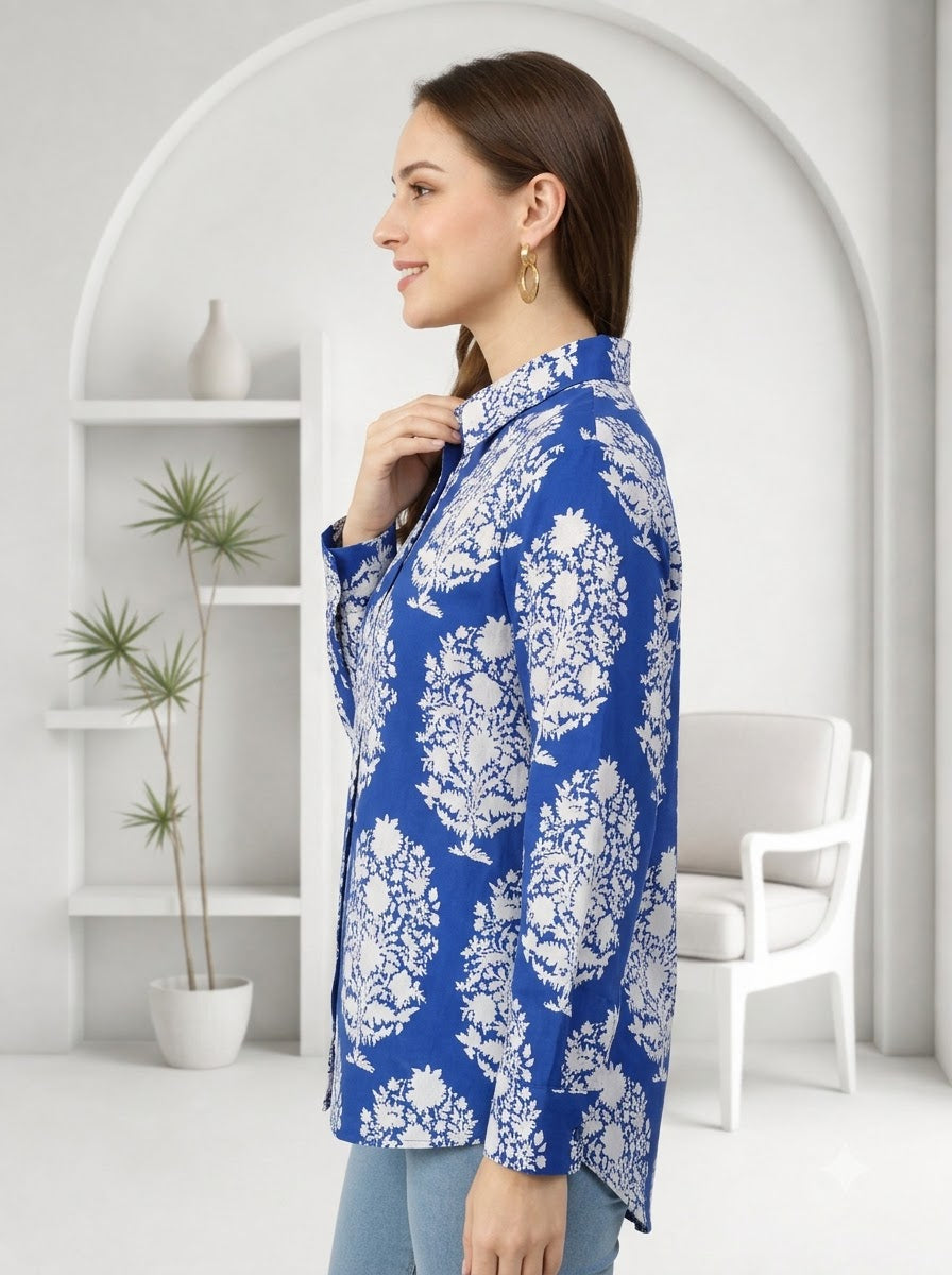 Woman in blue floral print blouse, stylish plus size fashion for everyday wear