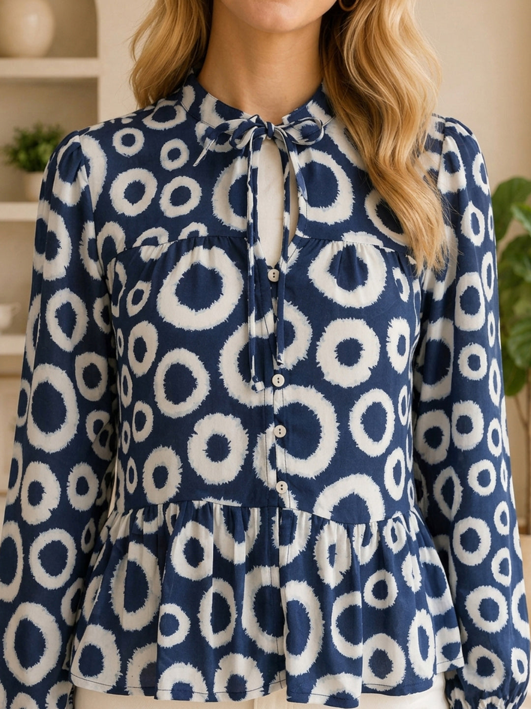 Navy blue and white circle print blouse with tie neck and ruffle hem, plus size women's fashion