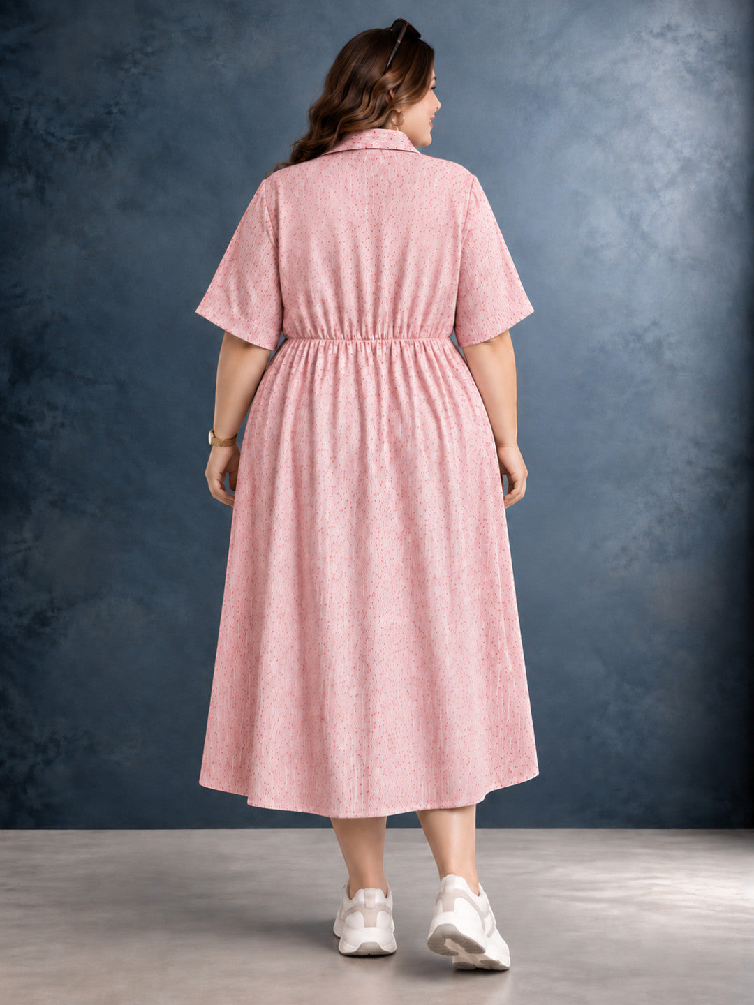 Plus size pink polka dot shirt dress - side view