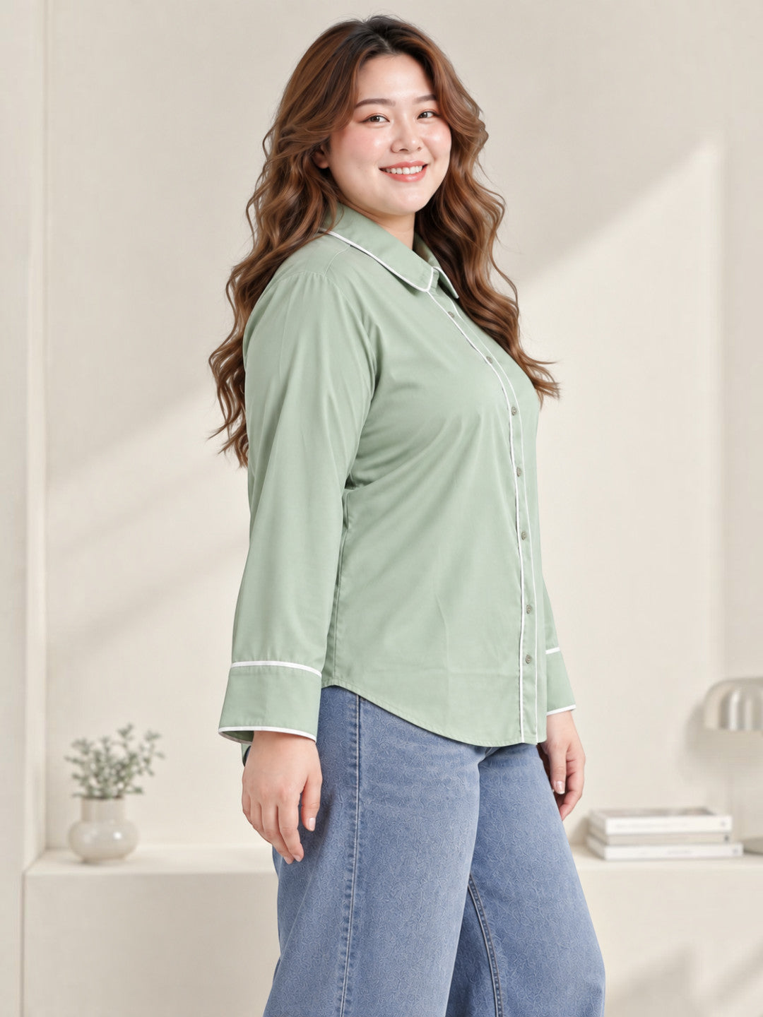 Plus size green shirt with contrast piping on collar and placket