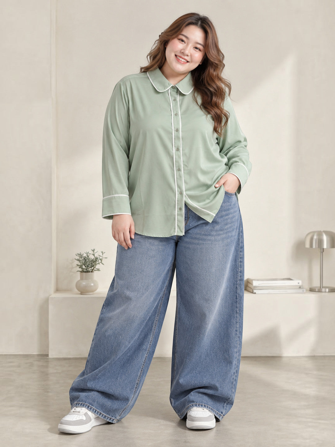 Close-up of contrast piping on green shirt