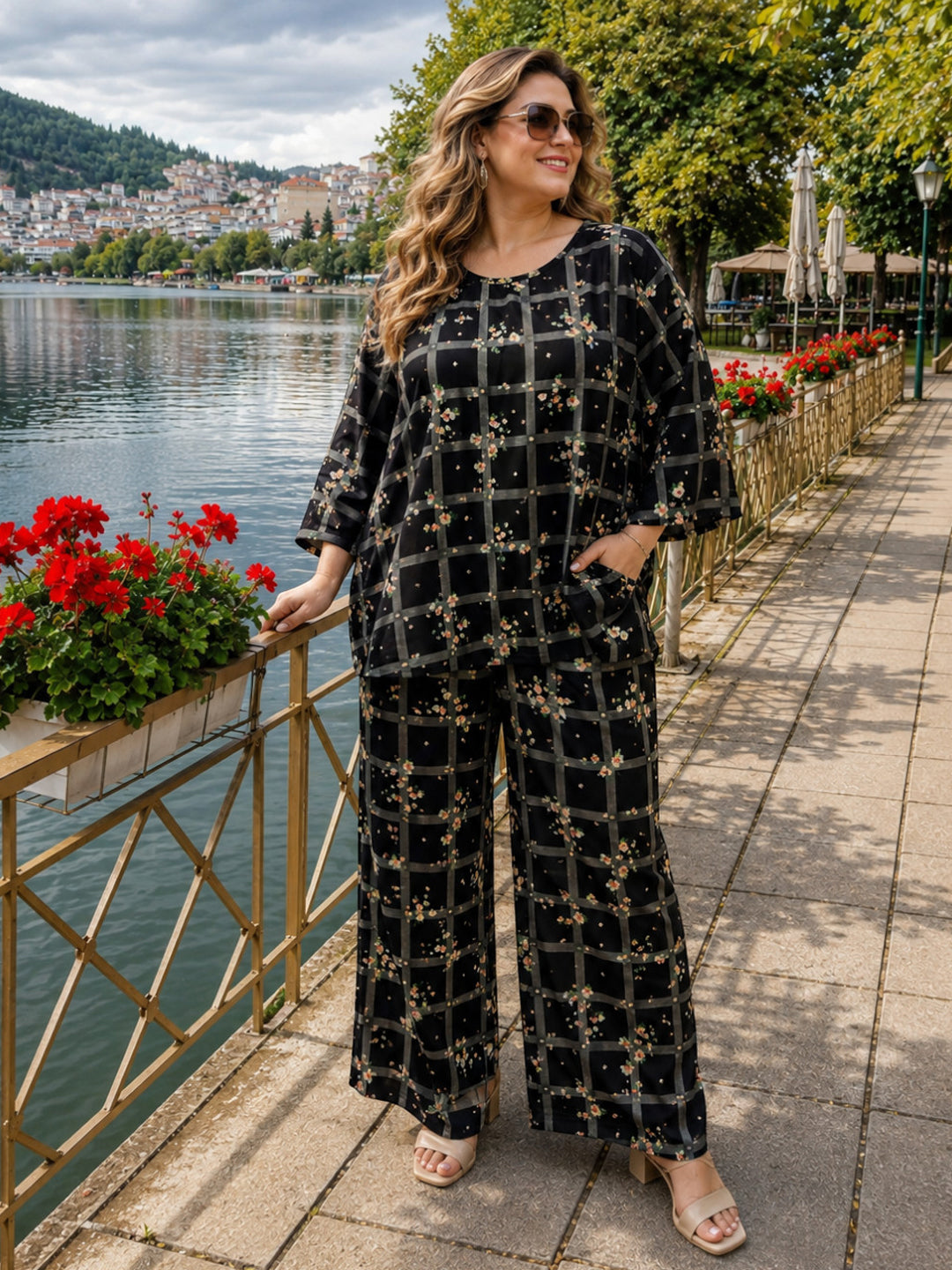 Women plus size navy blue floral print 3/4 sleeve top and pant co-ord set - front view