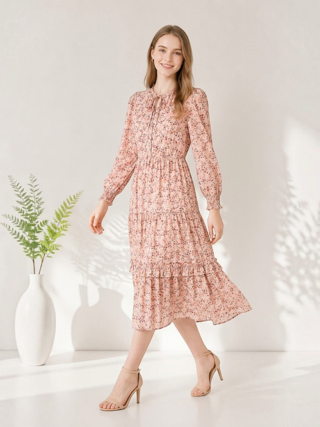 Pink floral midi dress with long sleeves, tiered ruffle hem, and tie neck for women's fashion