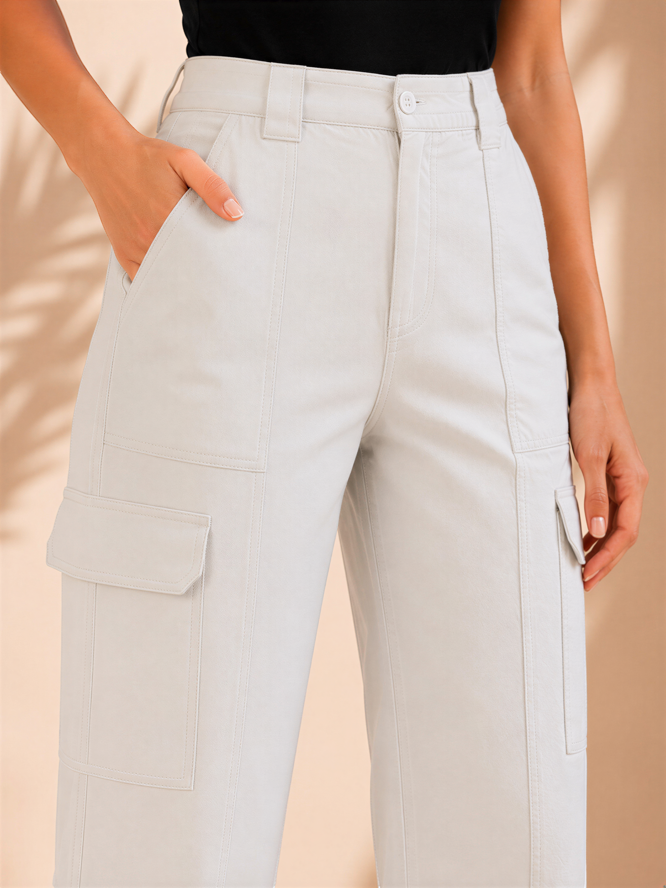 A person wearing white cargo pants with pockets.